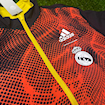 Picture of Real Madrid 2024 Double Sided Jacket Black & Red/Yellow